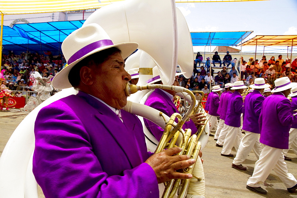 Tuba players in a marching band in the procession of the Carnaval de Oruro, Oruro, Bolivia