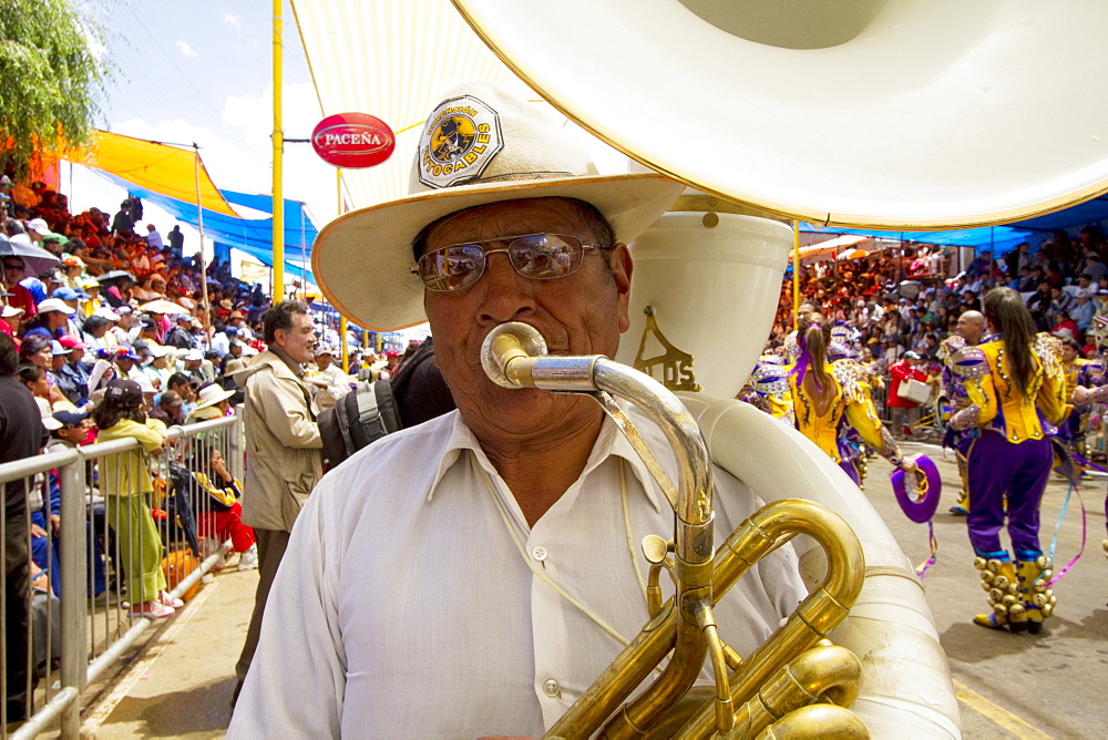 Tuba player in a marching band in the procession of the Carnaval de Oruro, Oruro, Bolivia