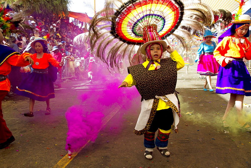 Suri Sicuri dancers wearing elaborate feather headdress in the procession of the Carnaval de Oruro, Oruro, Bolivia