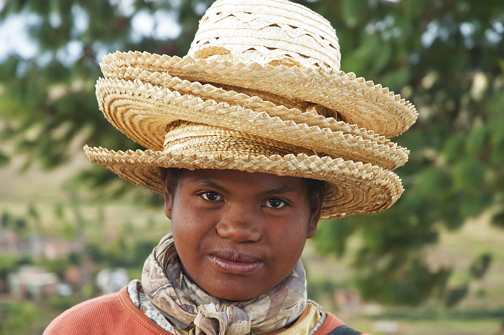 Girl selling hats in Tritiva, Antananarivo Province, Madagascar