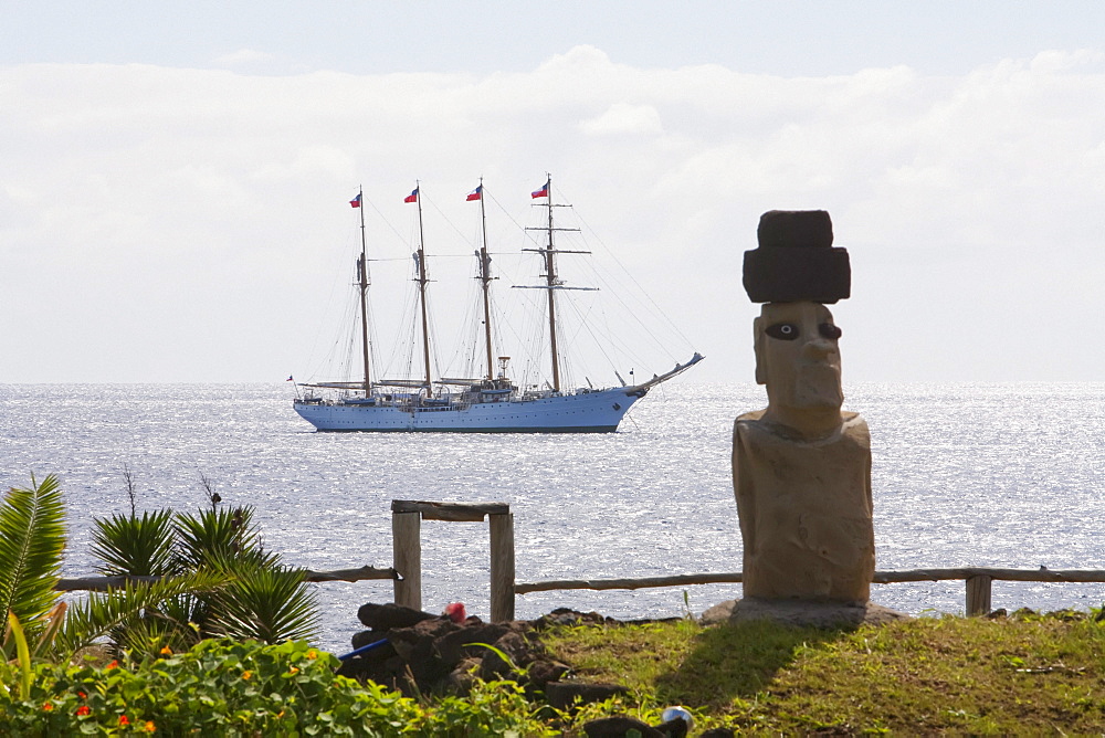 Moai and the four-mast barquentine, Esmeralda in Hanga Roa Harbour, Rapa Nui (Easter Island), Chile