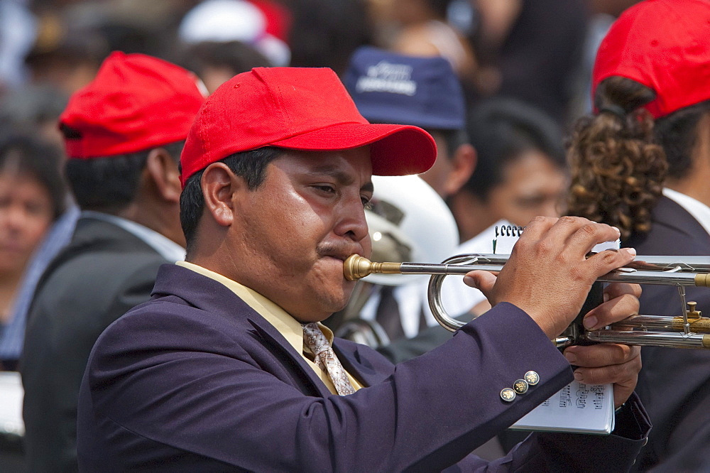 A music band plays funeral marches during the Procession of the Holy Cross on Good Friday in Antigua Guatemala, Sacatepuquez, Guatemala