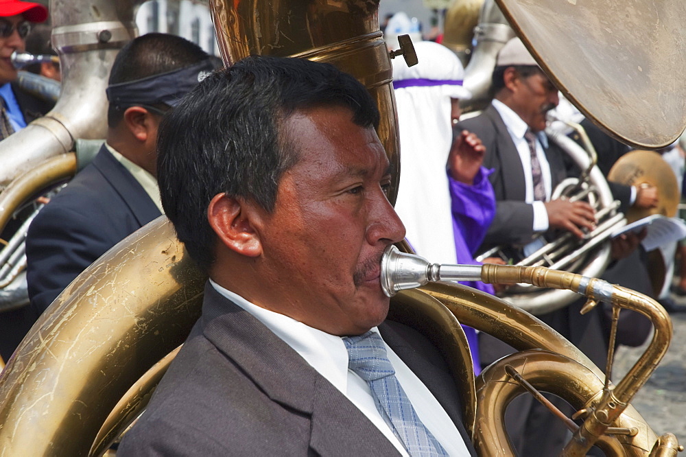 A music band plays funeral marches during the Procession of the Holy Cross on Good Friday in Antigua Guatemala, Sacatepuquez, Guatemala