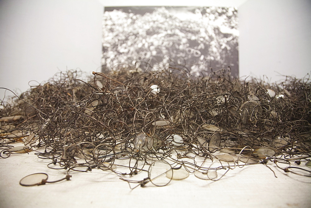 Pile of glasses and spectacles belonging to victims murdered at the Auschwitz Concentration Camp, Oswiecim, Malopolska, Poland