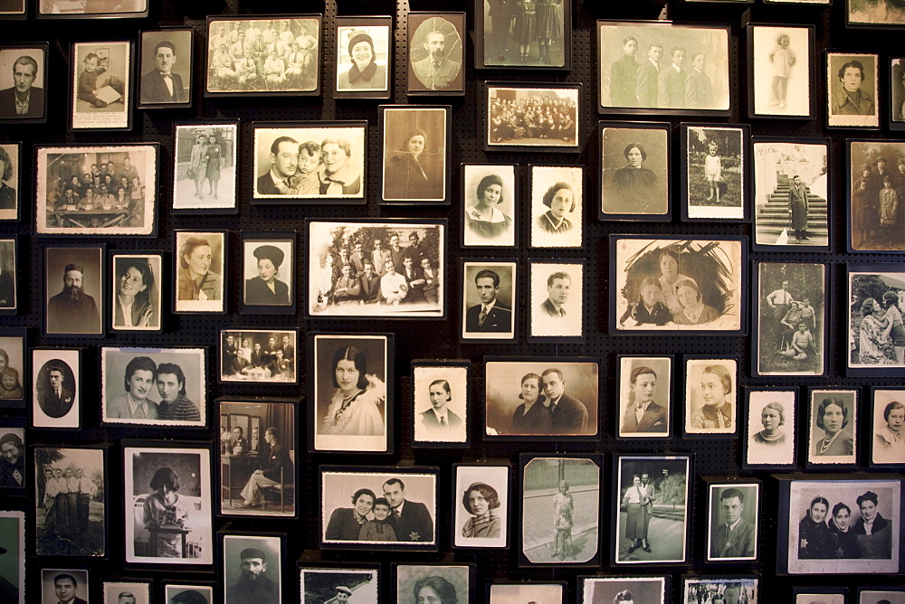 Installation at the Sauna displaying photographs found among the belongings of people murdered at the Auschwitz-Birkenau Concentration Camp, Oswiecim, Malopolska, Poland