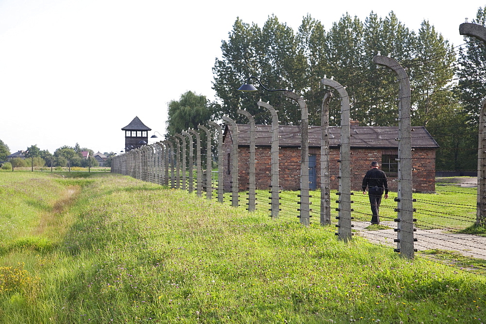 Electrified barbed wire fence along the perimeter of the Auschwitz-Birkenau Concentration Camp, Oswiecim, Malopolska, Poland