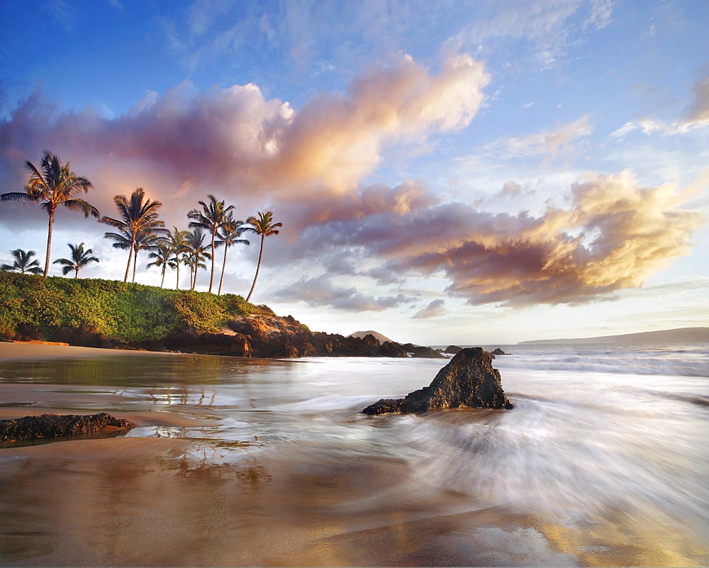 Hawaii, Maui, Makena, Secret Beach at sunset.