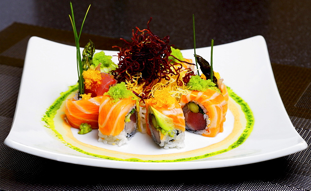 Delicious Presentation Of Colorful Sushi Platter.