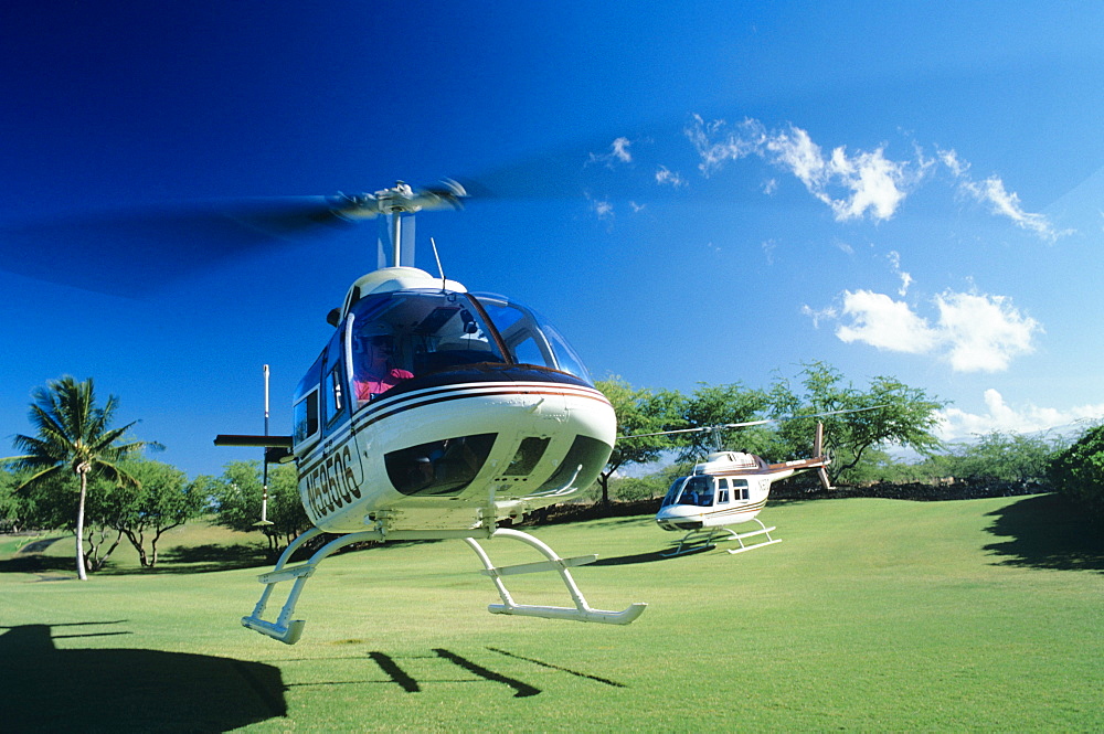 Hawaii, Big Island, Helicopter Mauna Lani Bay taking Off.