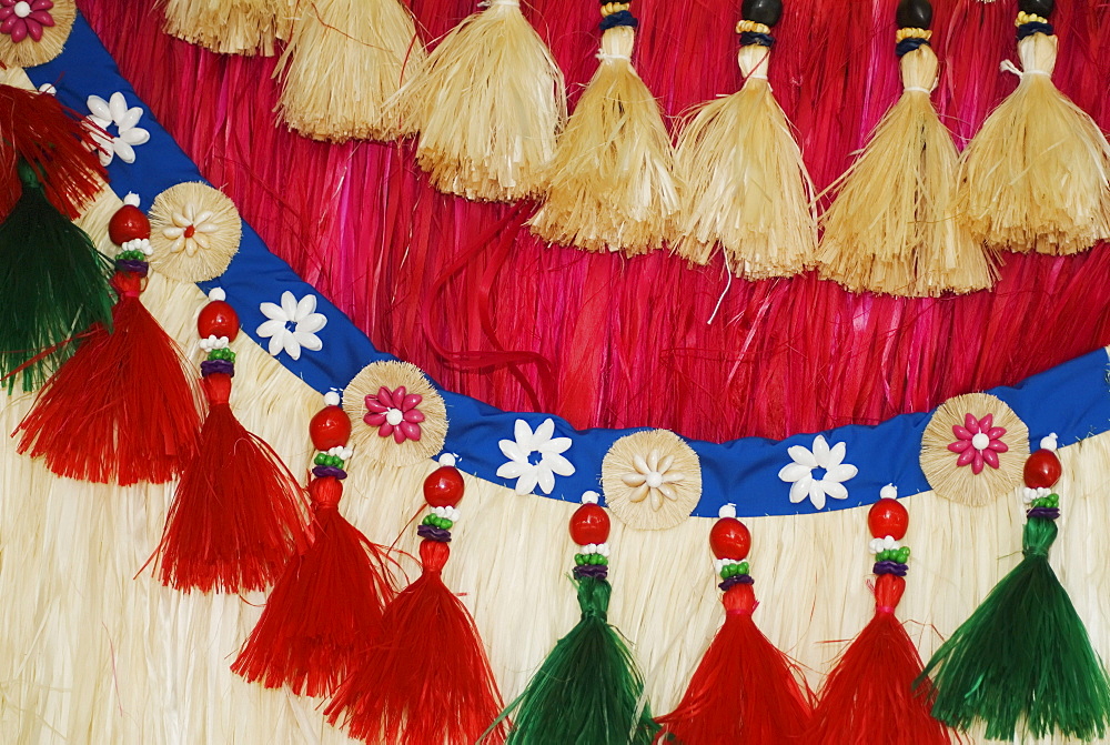 Close-up of traditional Tahitian hula skirts and belts.