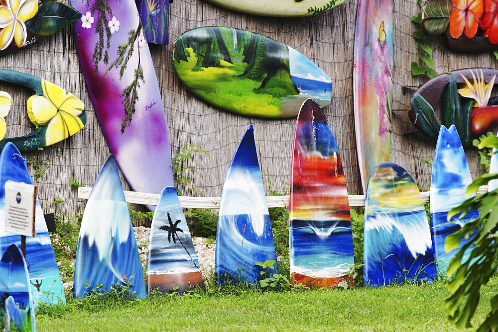 Hawaii, Oahu, North Shore, Haleiwa, Elaborately painted surfboards by Ron Artis.