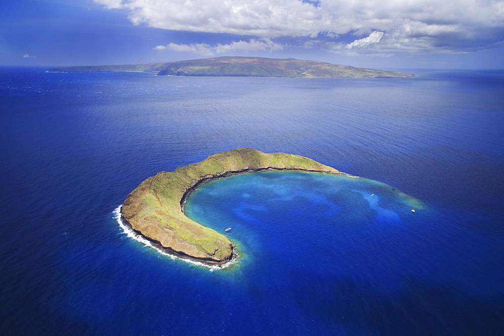 Hawaii, Maui, Molokini with Kaho'olawe in the distance.