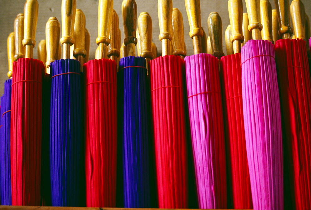 Thailand, Baw Sang, line of colorful closed umbrellas