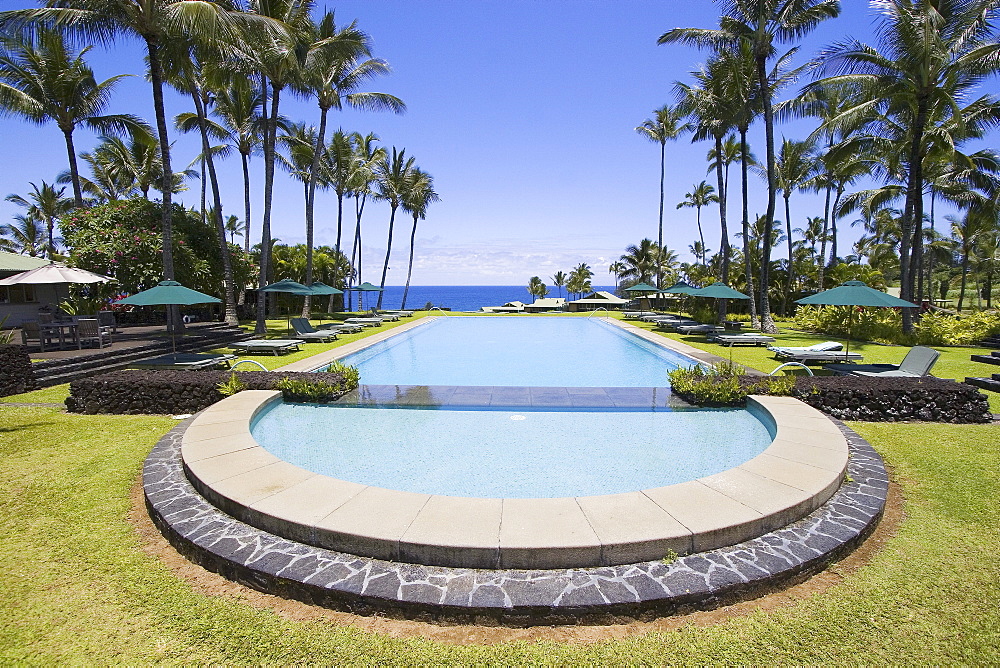 Hawaii, Maui, Hana Coast, Swimming pool at the Sea Ranch Cottages at Hotel Hana.