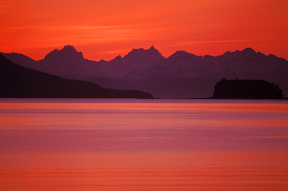 Alaska, Favorite Channel, Lynn Canal, Chilkat mountains. Sunset over the water.