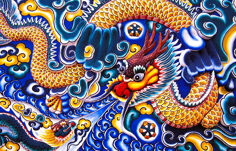 Thailand, Ayuthaya, Bang Pa-in Palace, Brightly painted Chinese style wood carvings.