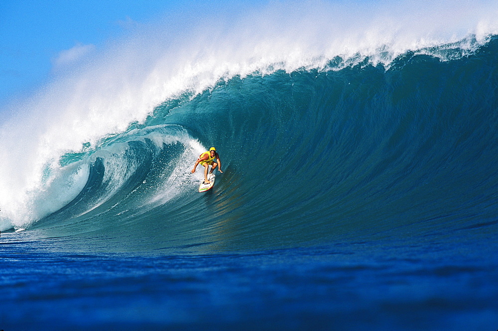 Hawaii, Oahu, Liam (surfer) surfing Pipeline wave.