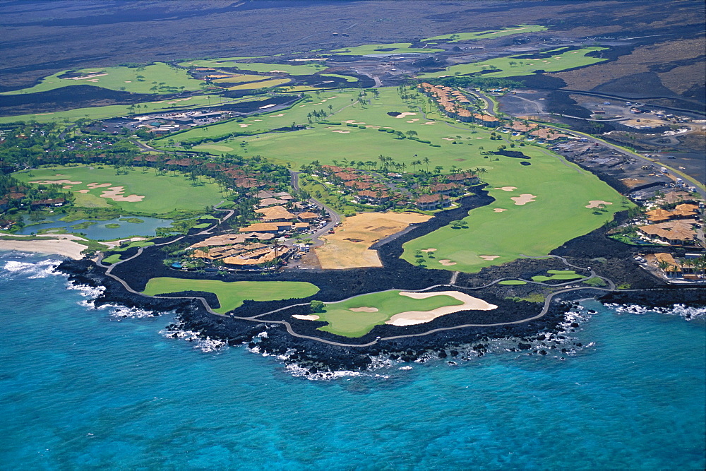 Hawaii, Big Island, Kona aerial Hualalai Resort landscape of golf course and grounds coast 