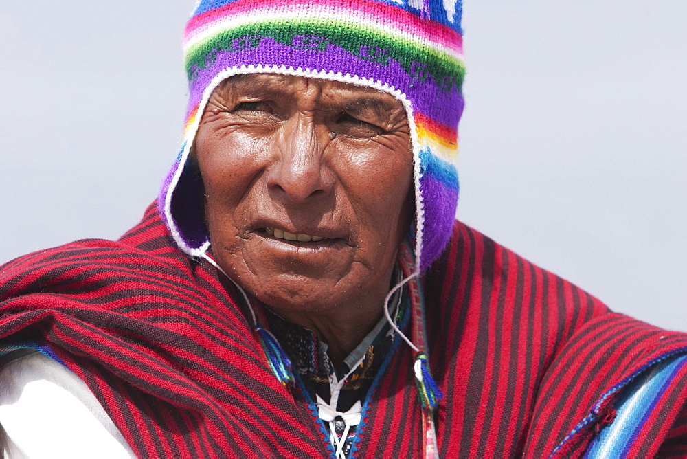 Yatiri (Aymara Healer) Performing An Ancient Sacrificial Burning Rite To Bring The Good Will Of The Goddess Pachamama (Mother Earth), Isla Del Sol In Titicaca Lake, La Paz Department, Bolivia