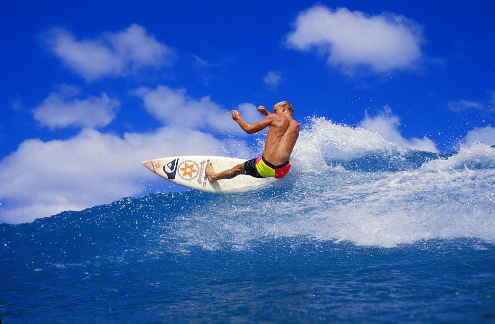 Hawaii, Noah Budroe Rips Off Top Of Wave With Board Facing Camera, Surfing