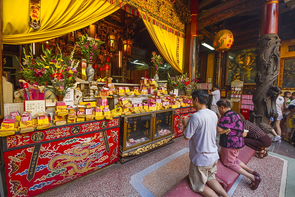 People praying at a shrine in the Altar of Heaven (Tiantan), Tainan, Taiwan