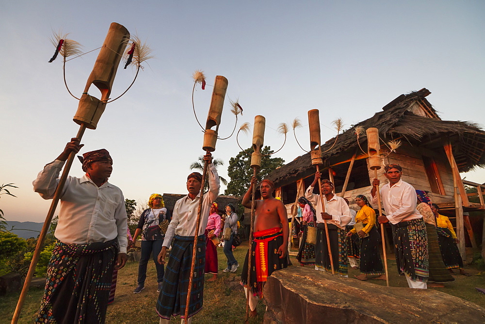 Manggarai men performing a traditional dance with poles, Melo village, Flores, East Nusa Tenggara, Indonesia