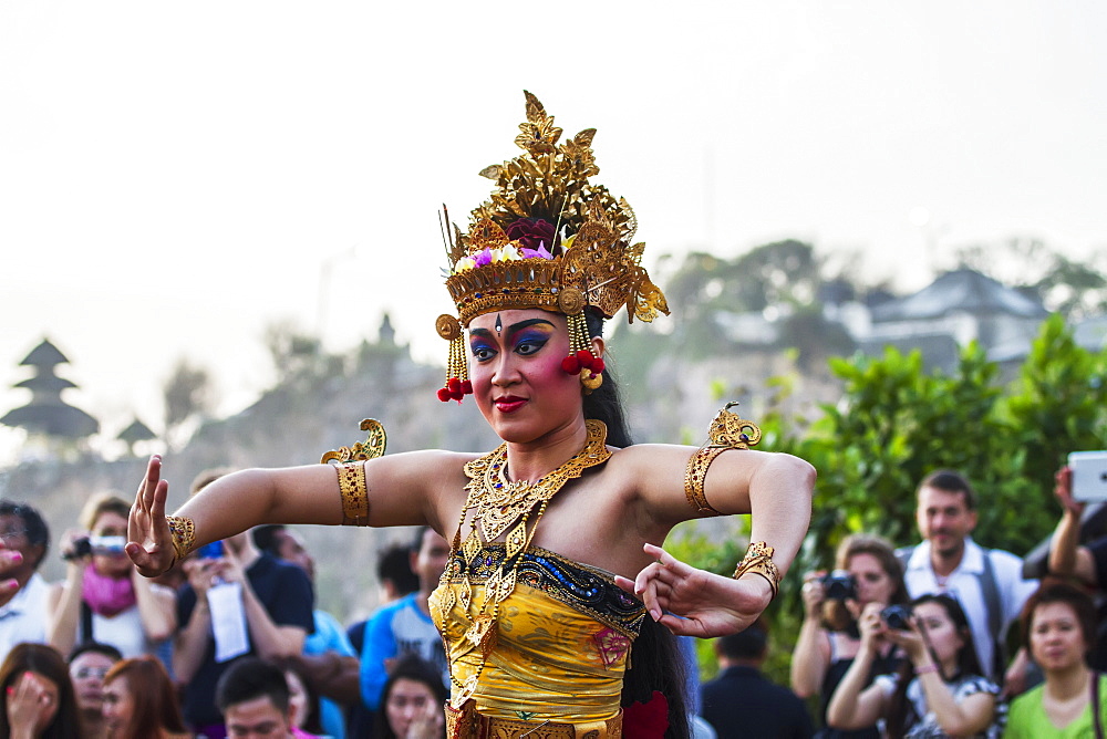 Balinese dancers using codified hand positions and gestures during a Kecak dance performance, Ulu Watu, Bali, Indonesia