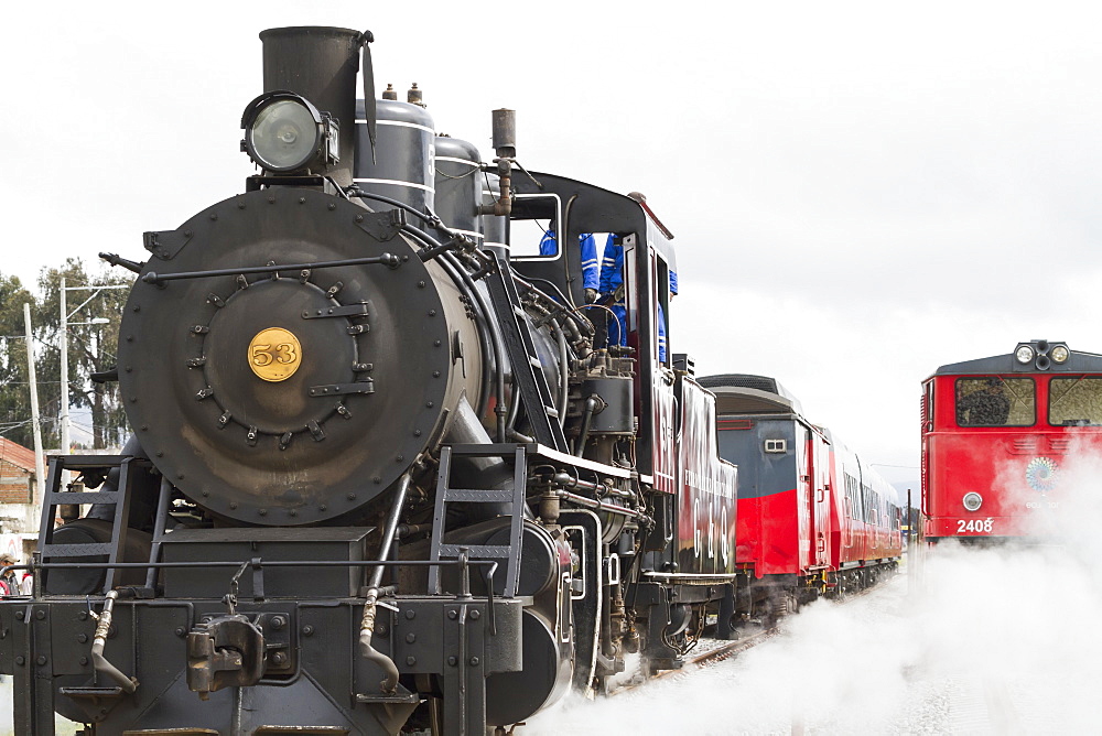 Baldwin 2-8-0 steam locomotive No.53 and diesel locomotive of Ferrocarriles del Ecuador, Colta, Chimborazo, Ecuador