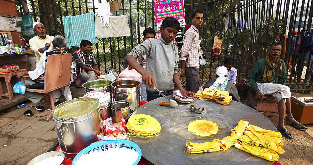 Street food stall and barbers in the market