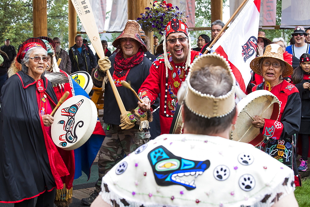 People at the Tlingit Celebration, participants are entering the hall to traditional drumming, Teslin, Yukon, Canada