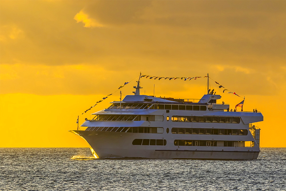 Star of Honolulu making a sunset cruise viewed from Magic Island, Ala Monana beach park, Honolulu, Oahu, Hawaii, United States of America