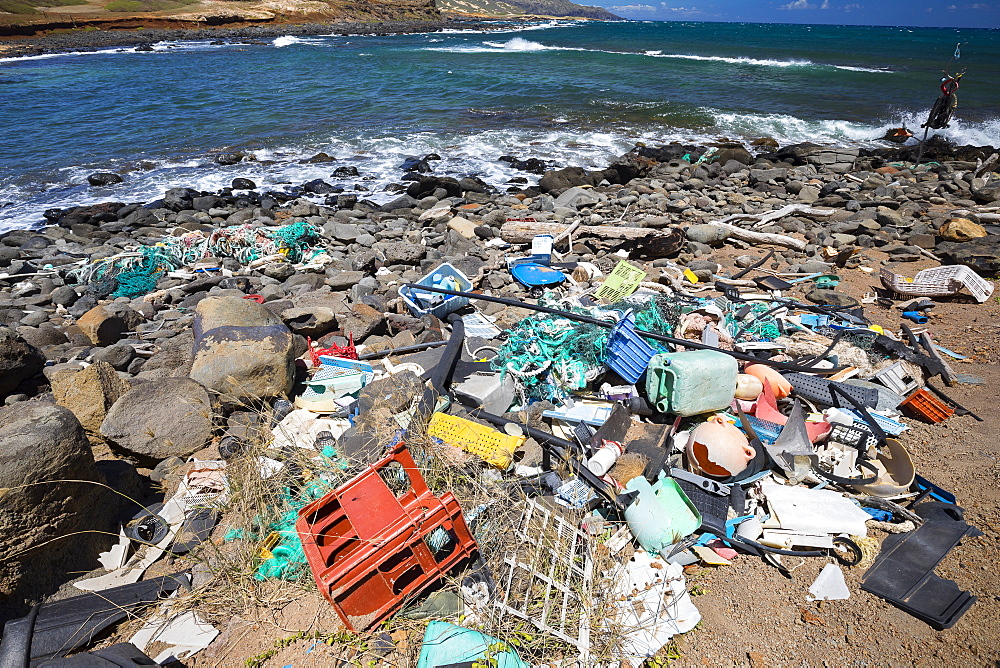 Much of the north side of the island of Molokai in inaccessible. Trade winds blow onshore regularly bringing with them piles of plastic that has been floating around the Pacific Ocean for years and years, Molokai, Hawaii, United States of America