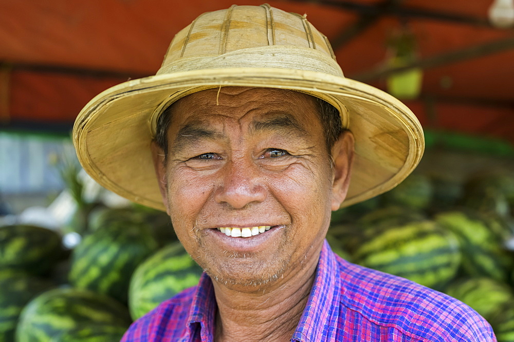 Portrait of a man selling watermelons, Taungyii, Shan State, Myanmar