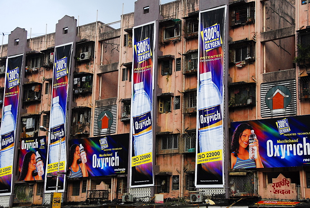 Advertisements on apartment buildings of Mumbai, Maharashtra, India, Asia