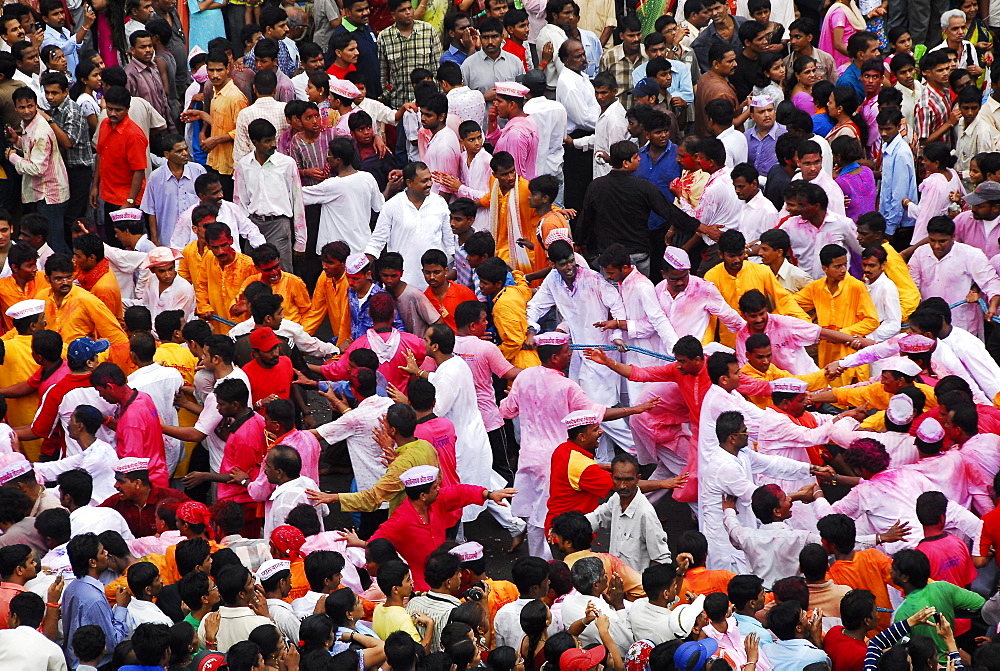 People forming a chain during the Ganesha idol procession to immersion, Mumbai, Maharashtra, India, Asia