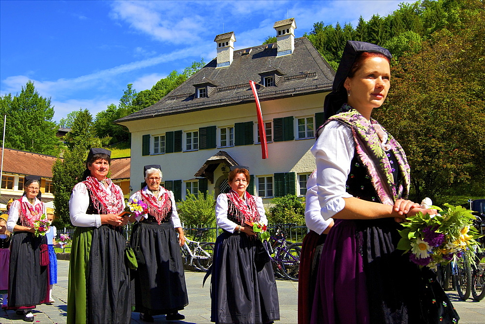 Participants in the Feast of Corpus Christi Celebrations in their traditional dress, St. Wolfgang, Wolfgangsee Lake, Austria, Europe