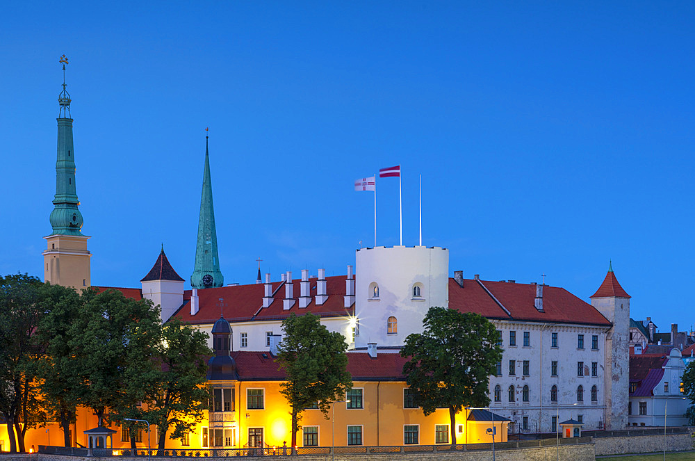 Riga Castle and Skyline at dusk, Old Town, UNESCO World Heritage Site, Riga, Latvia, Europe