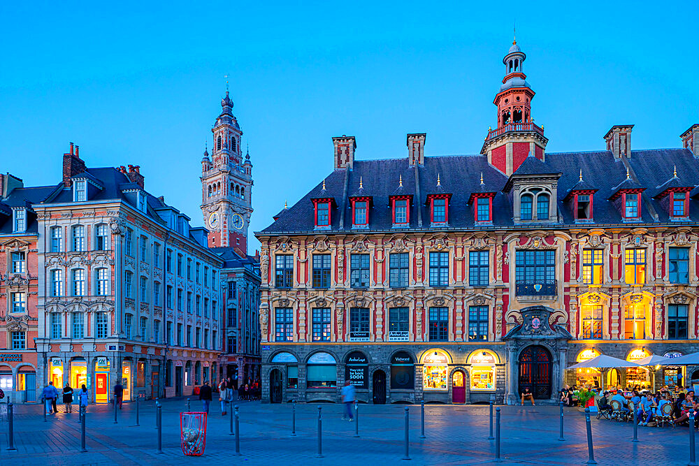 The Grand Place and Lille Chamber of Commerce Belfry at dusk, Lille, Nord, France, Europe