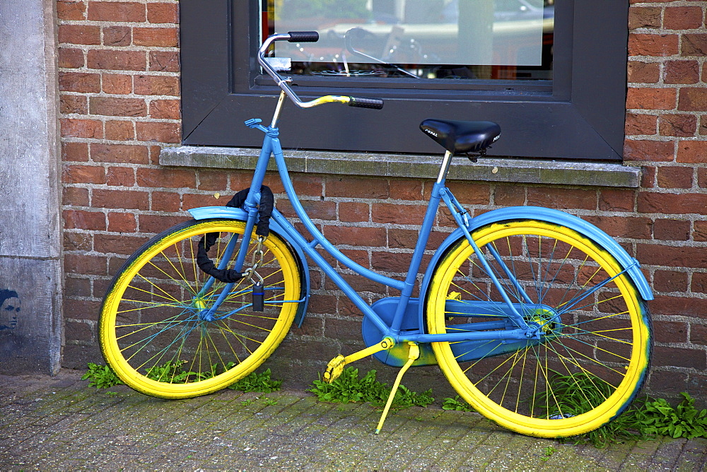 Blue and yellow bicycle, Amsterdam, Netherlands, Europe