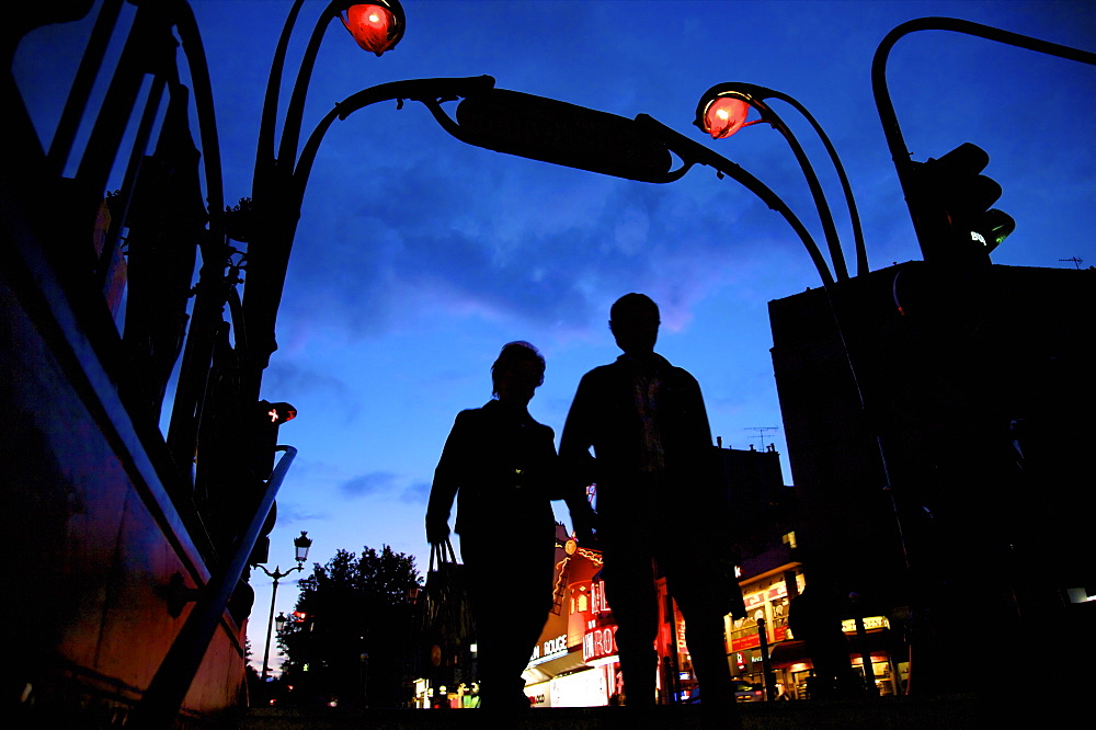 Metro entrance, Montmartre, with Moulin Rouge in the background, Paris, France, Europe