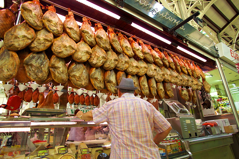 Mercado Central (Central Market) stall selling cured ham, Valencia, Spain, Europe