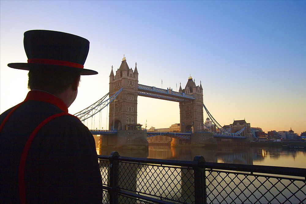 Beefeater and Tower Bridge, London, England, United Kingdom, Europe