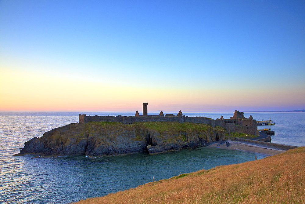 Peel Castle at sunset, St. Patrick's Isle, Isle of Man, Europe 