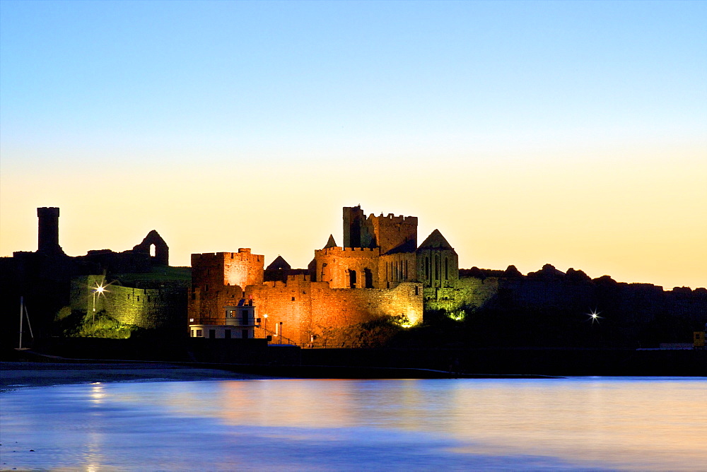 Peel Castle at dusk, St. Patrick's Isle, Isle of Man, Europe 