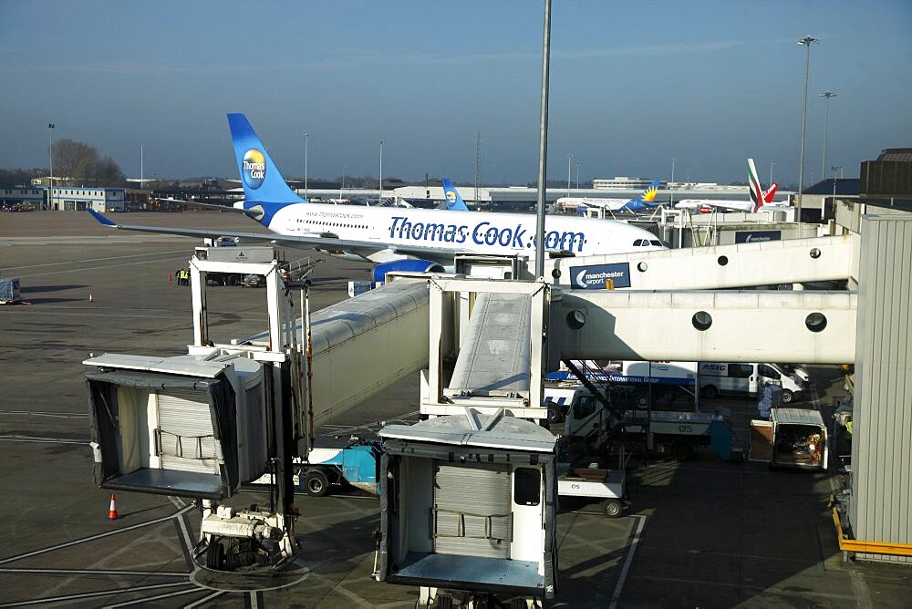 Thomas Cook aeroplane at gate, Terminal 1, Airport, Manchester, England, United Kingdom, Europe