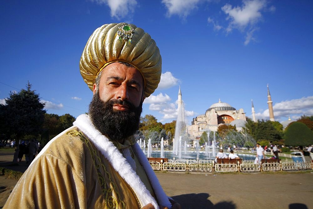 Man dressed as a sultan at Haghia Sophia Mosque (Aya Sofya), Istanbul, Turkey, Europe