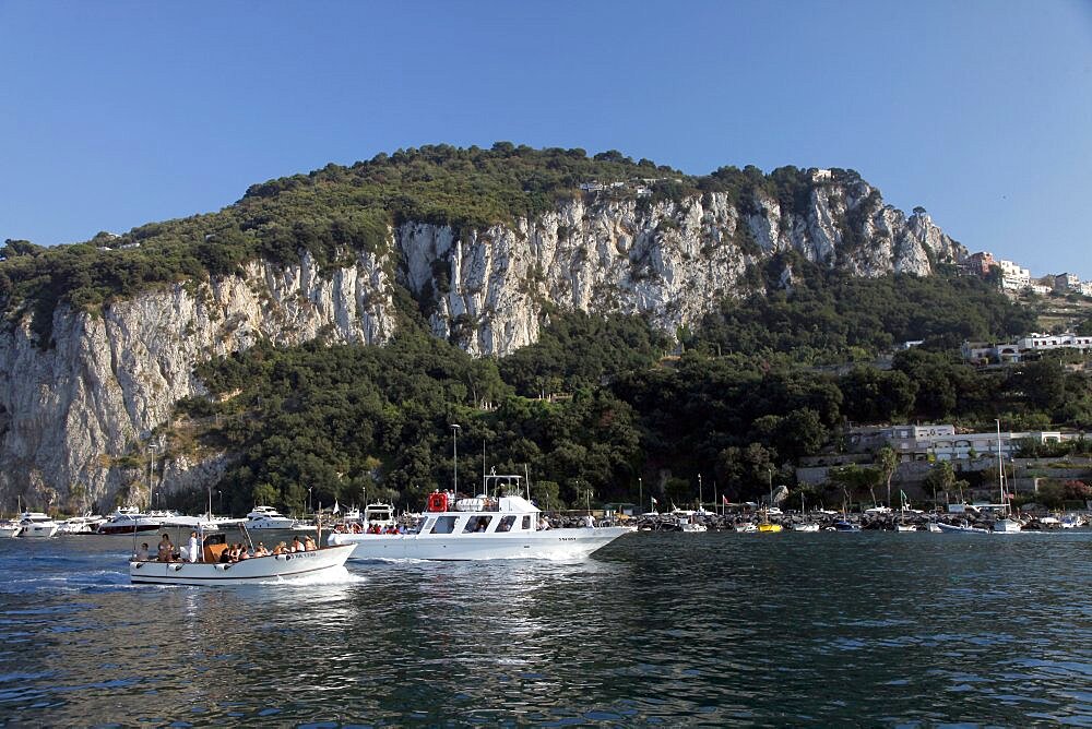 Pleasure boats arriving at Harbour, Capri, Campania, Italy, Europe