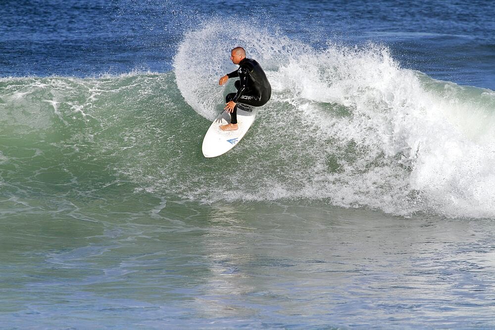 Surfer in Indian Ocean, Jeffreys Bay, Eastern Cape, South Africa, Africa