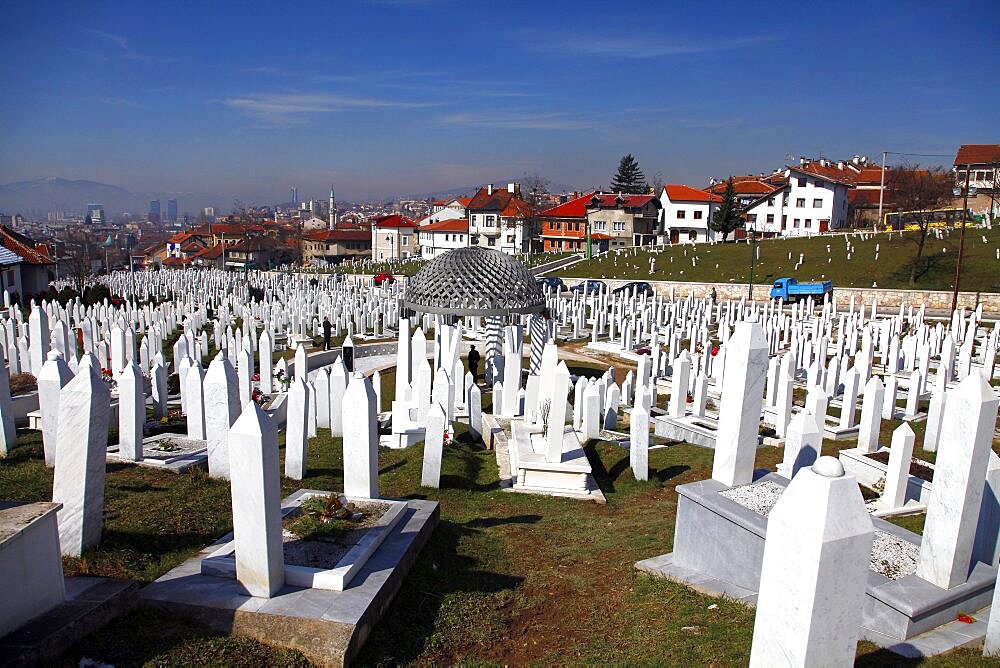 Grave of Alija Izetbegovic and Muslim gravestones at Kovaci Martyrs Memorial Cemetery, Sarajevo, Bosnia, Bosnia and Herzegovina. Eirp[e