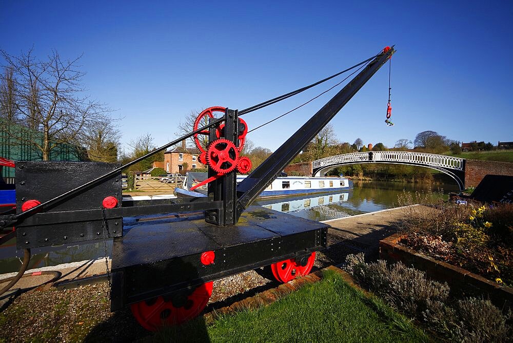 Black crane and white bridge, Northamptonshire, England, United Kingdom, Europe